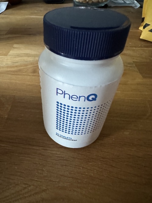 PhenQ bottle on table