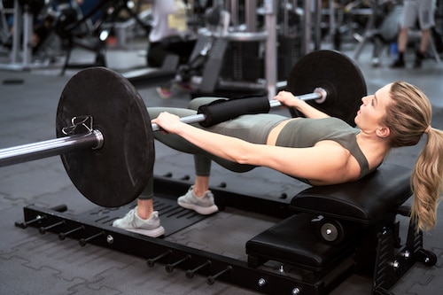 barbell hip thrust in gym