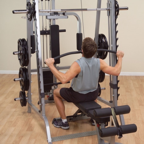 Body Solid Series 7 Smith Machine with weights in use
