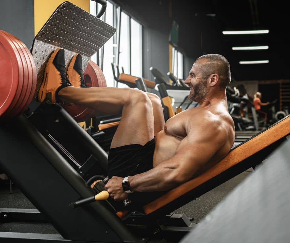 man doing Leg Press Calf Raise in gym